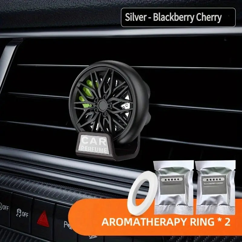Car AC Vent Air Freshener Perfume 360° Rotating Alloy Wheel Shape Designed
