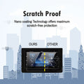 Tempered glass screen protector covering a car's touch screen, providing strong protection against scratches